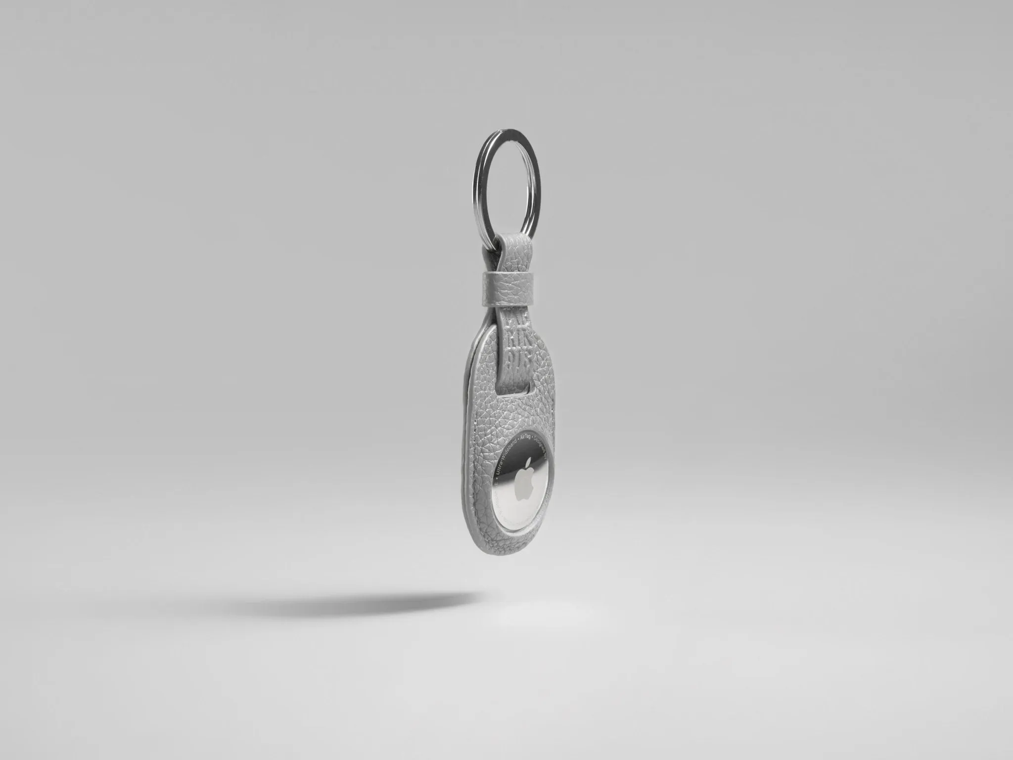 The 0.5ml Leather AirTag Keychain | Sleek Tracker Holder for Keys, Bags & More